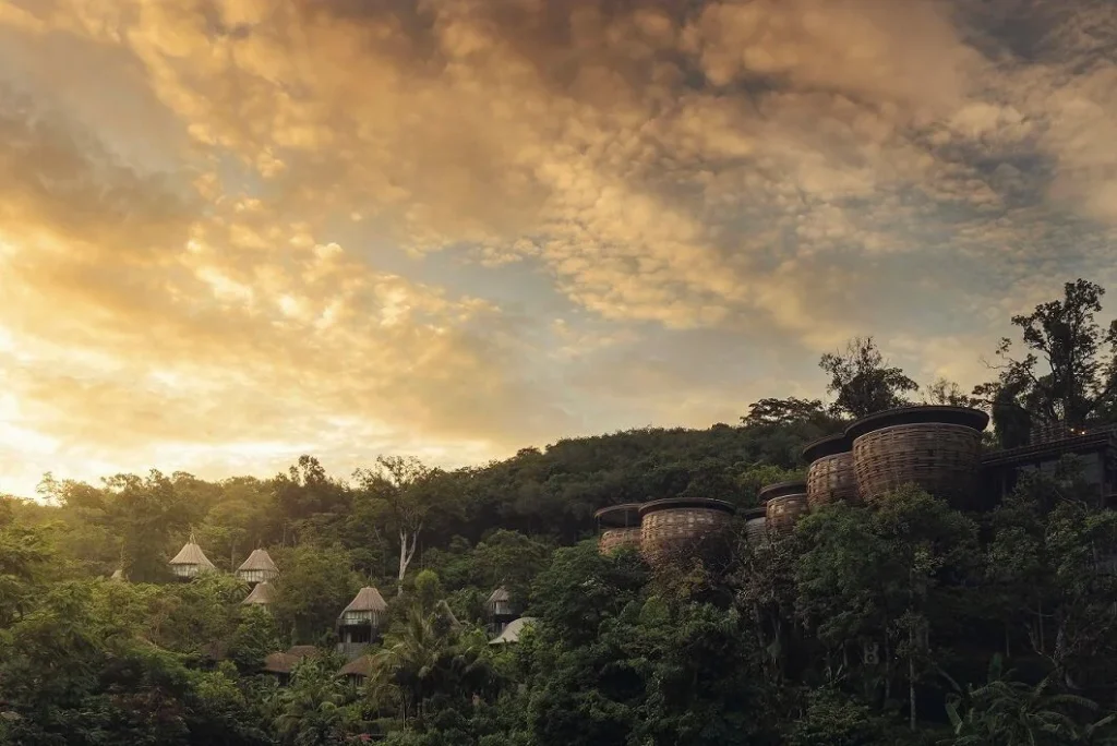 Aerial view of Keemala Phuket forest resort with jungle canopy and pool villas