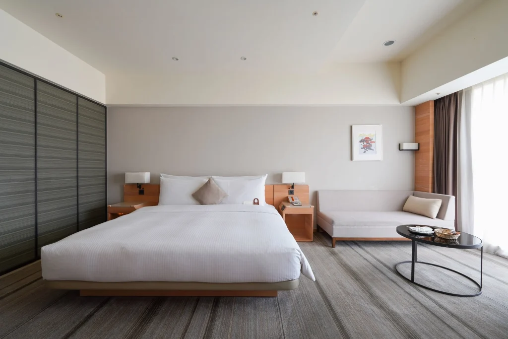 Contemporary standard room at HOTEL COZZI Ximen Tainan with city views and neutral design