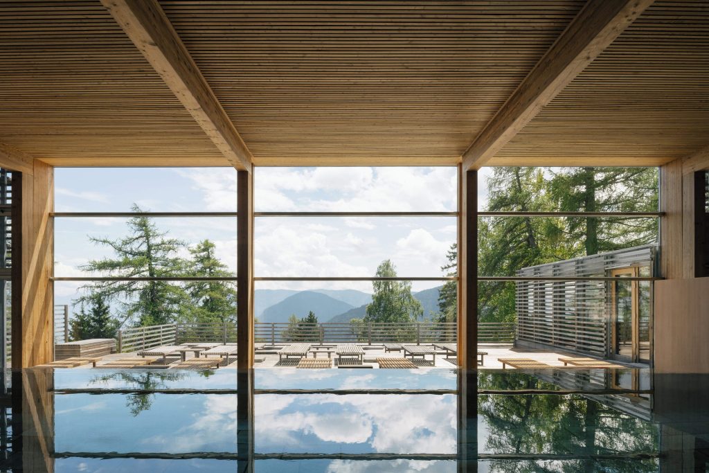 Aquiléia Spa at Vigilius Mountain Resort with natural materials, low timber ceiling and alpine landscape views