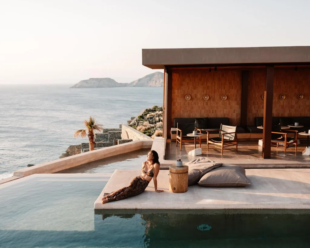 Acro Suites cliffside hotel perched above the Aegean Sea in Agia Pelagia, Crete