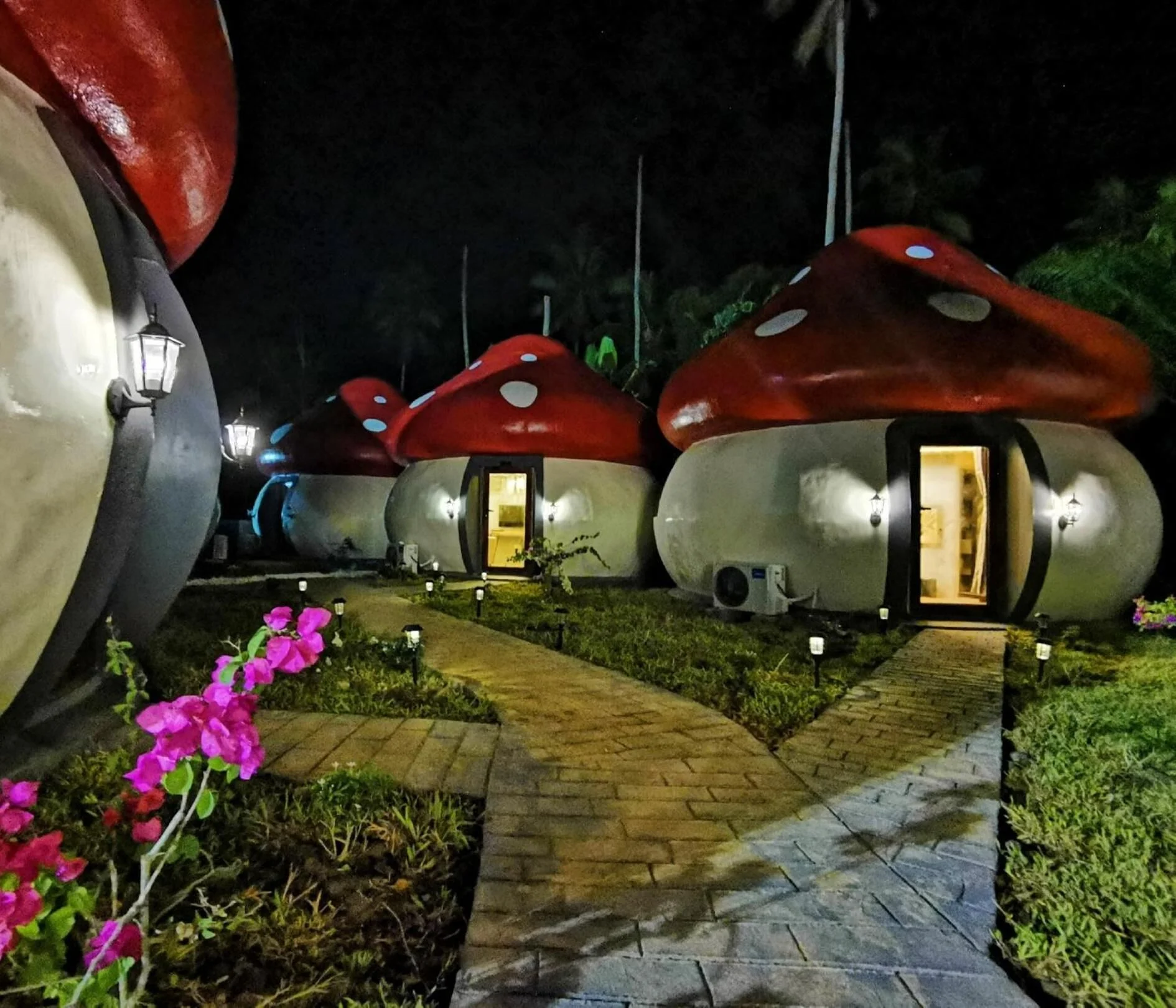 Mushrooms Inn exterior — eight giant mushroom-shaped houses in Semporna, Sabah