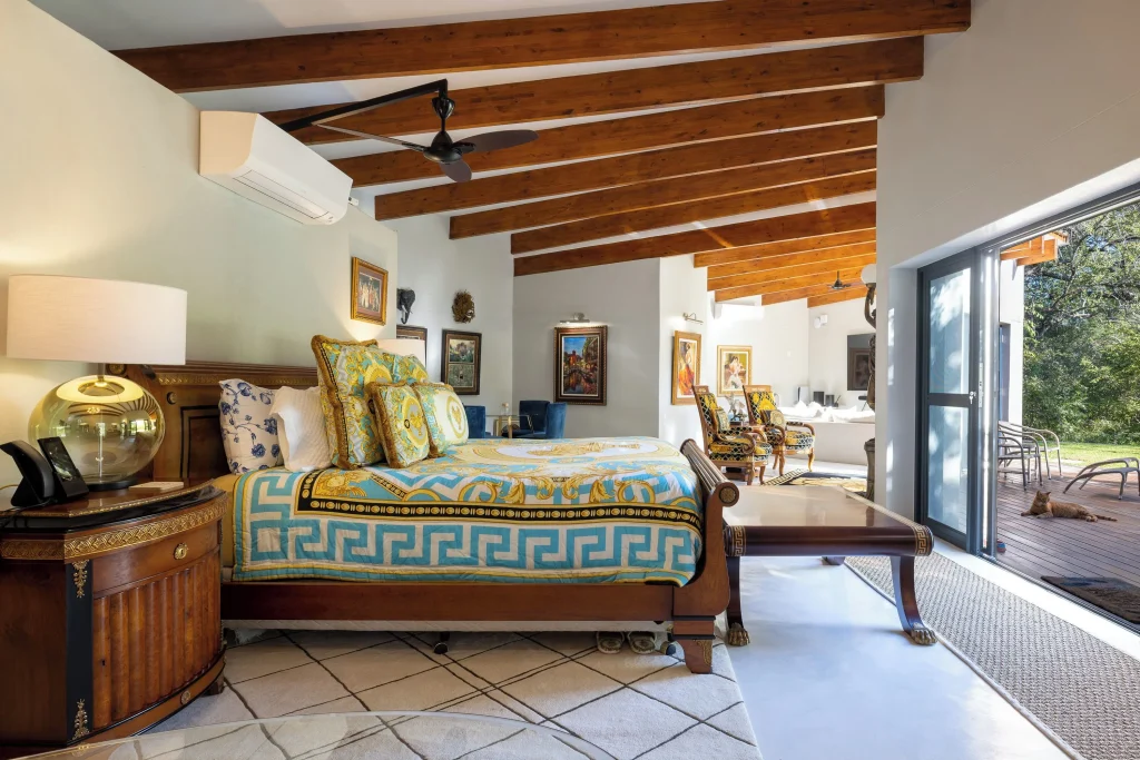 Interior of Oase by 7 Star Lodges Bradberry Suite showing open plan living space and private pool with bushveld views, Greater Kruger