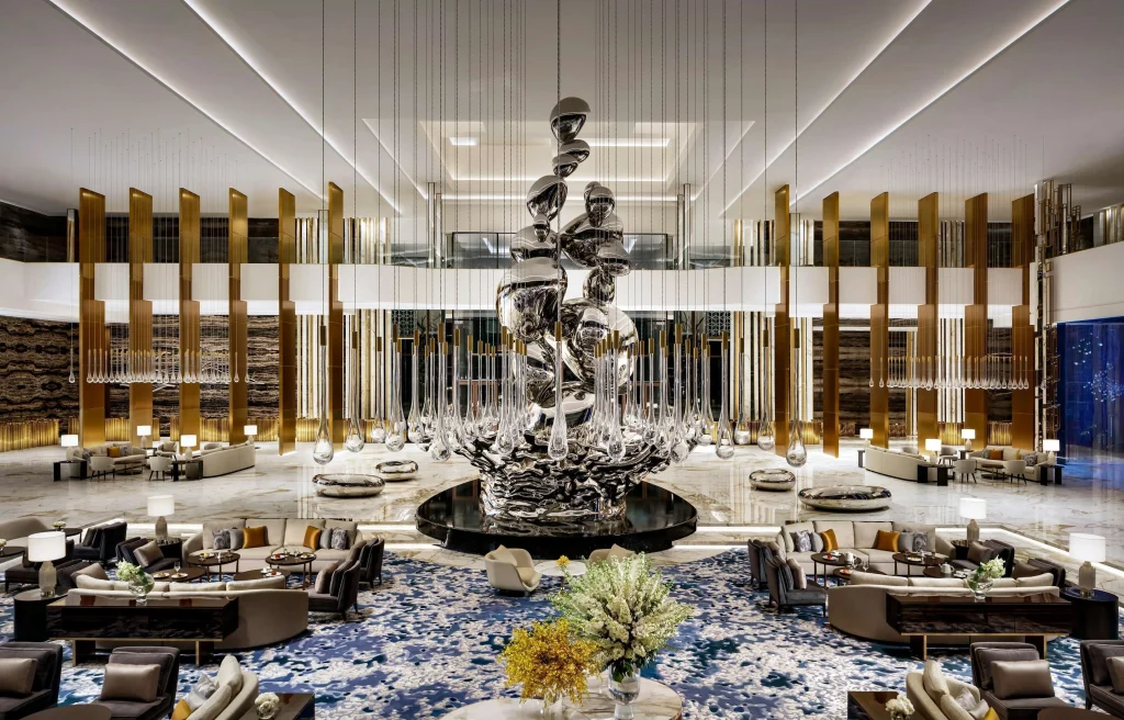 Dramatic restaurant interior with sculptural centerpiece at Atlantis The Royal Dubai