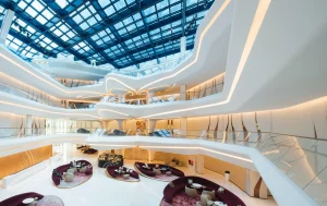 Futuristic curved atrium inside ME Dubai by Meliá